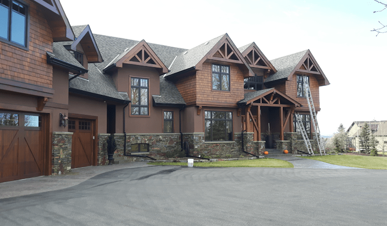 Clean Windows on Residential Mansion with large Driveway