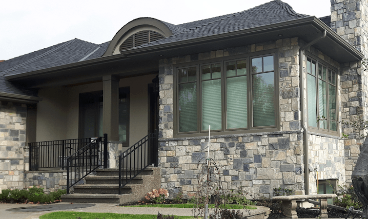 Clean Windows on Residential House Grey