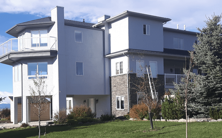 Clean Windows on Residential House White House Tall