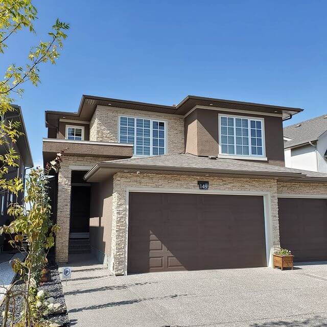 Clean Windows on Beige Residential House