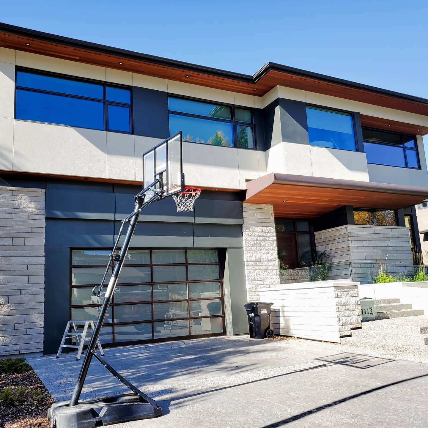 Clean Windows on Residential House with Basketball Net