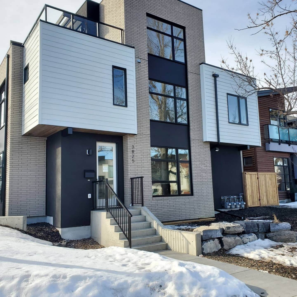 Clean Windows on Residential House with Snow