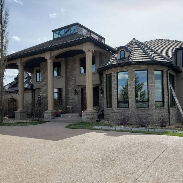 Clean Windows on Residential House With Large Beams