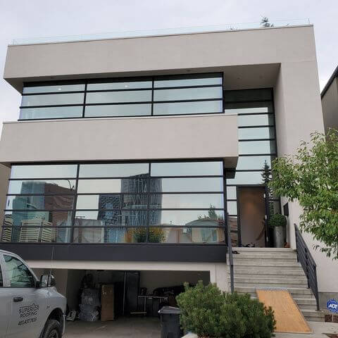 Clean Windows on Residential House With Multiple Houses