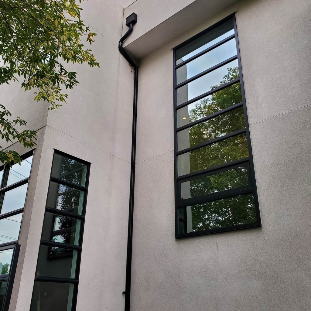 Clean Windows on Residential House Side